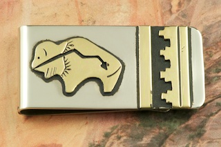 Beautiful Gold Fill Buffalo Design with Heartline on Sterling Silver set on a Nickel Silver Money Clip. Created by Navajo Artist Tommy Singer.
